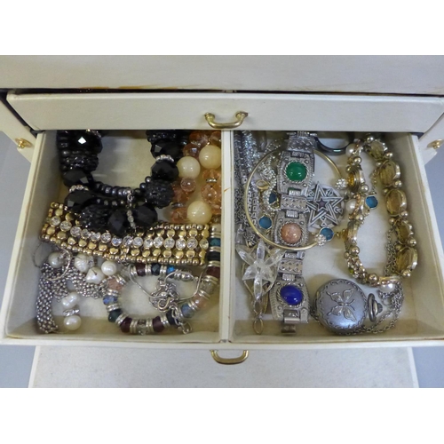 699 - A box of costume jewellery