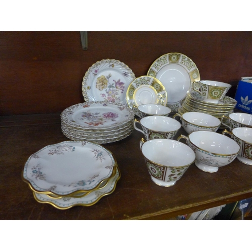 704 - Eight assorted Royal Crown Derby cups and saucers, dessert plates, etc.