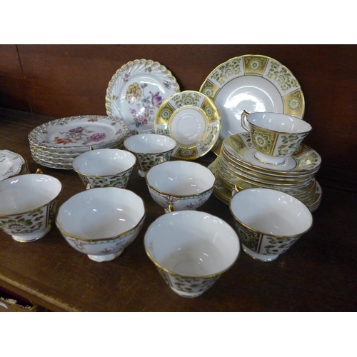 704 - Eight assorted Royal Crown Derby cups and saucers, dessert plates, etc.