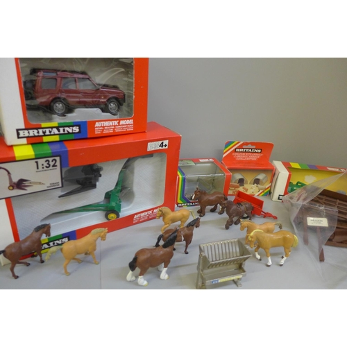 725 - A collection of Britains toys and model vehicles