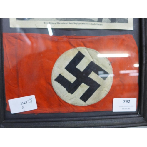 793 - A German WWII Third Reich armband and picture of Adolf Hitler, framed