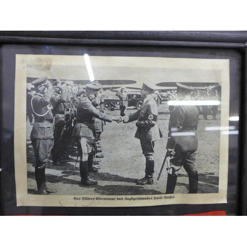 793 - A German WWII Third Reich armband and picture of Adolf Hitler, framed