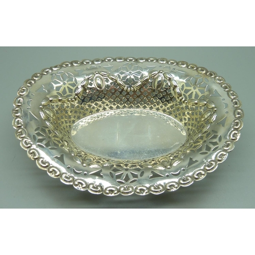 831 - A silver pierced and embossed oval dish, Sheffield 1910, 95g