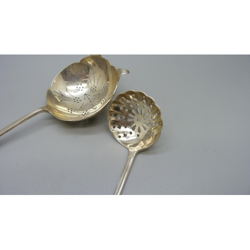 854 - Two silver sifter spoons, Birmingham 1901, Henry Matthews and Sheffield 1932, Emile Viner, 60g