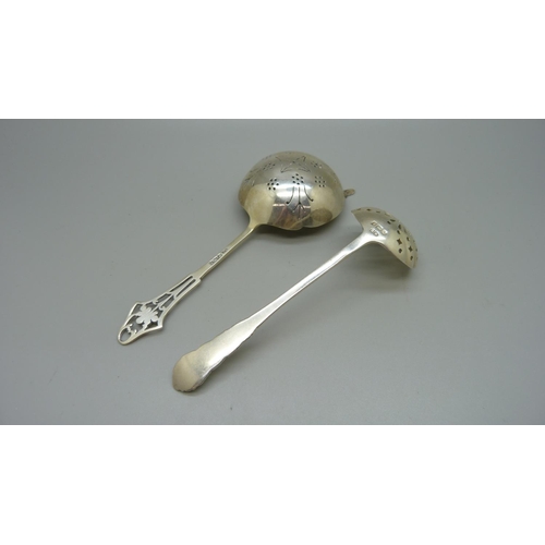 854 - Two silver sifter spoons, Birmingham 1901, Henry Matthews and Sheffield 1932, Emile Viner, 60g