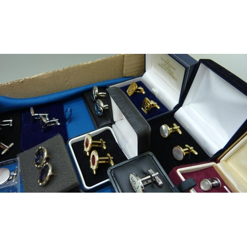 868 - Thirty five pairs of cufflinks and nine tie pins