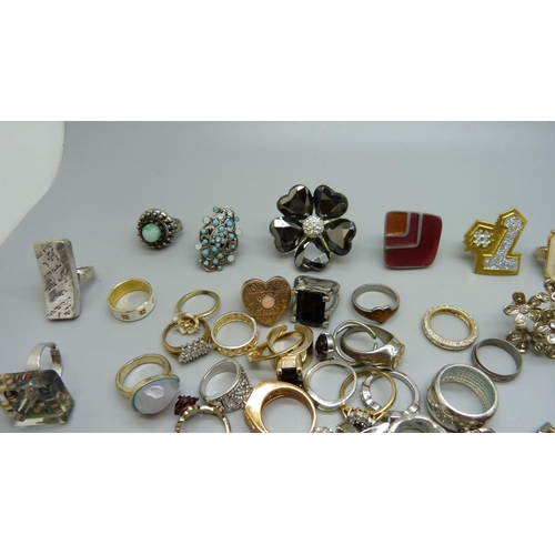 874 - Over sixty costume rings