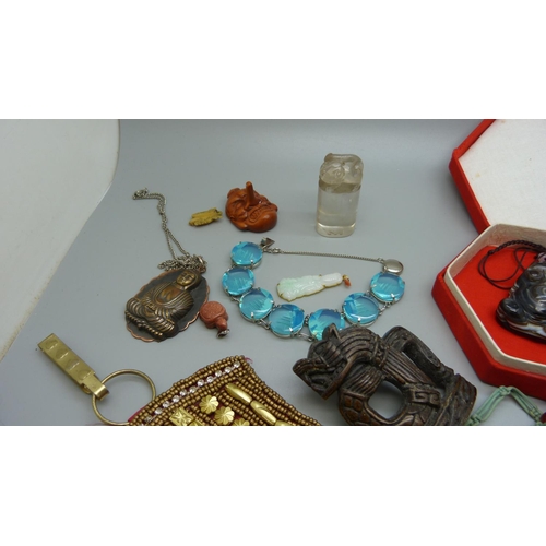 885 - A collection of vintage oriental jewellery including a Japanese Pagoda blue glass bracelet, rock cry... 