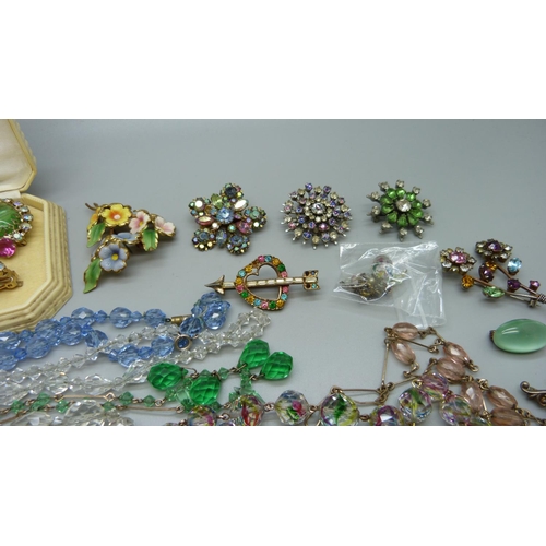 886 - A collection of costume jewellery including a matching brooch and earrings set, paste and stone set ... 