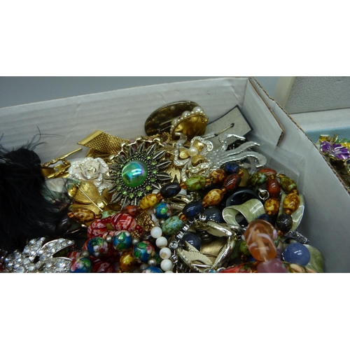 889 - A collection of costume jewellery, enamelled flower brooches, bracelets, bead necklaces, etc.