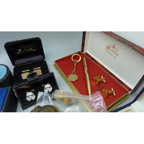 890 - A collection of cufflinks and tie pins