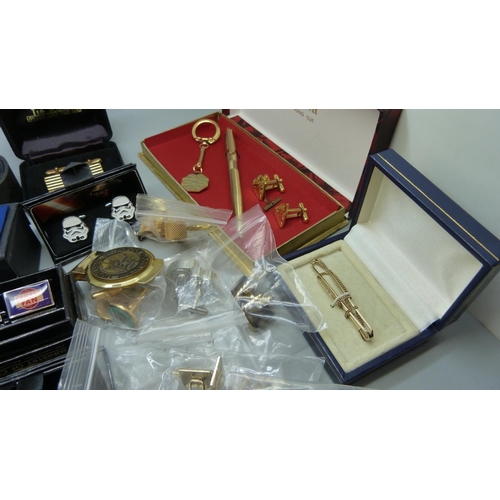 890 - A collection of cufflinks and tie pins