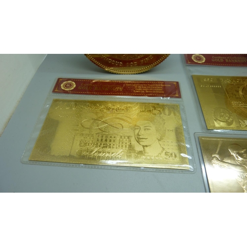 896 - Shop display oversized Sovereign and Krugerrand coins and 24ct gold plated banknotes