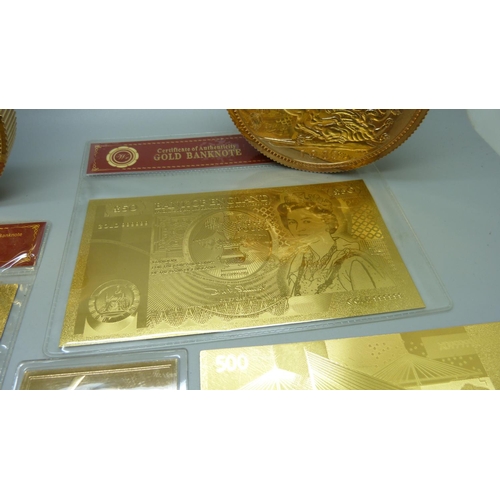 896 - Shop display oversized Sovereign and Krugerrand coins and 24ct gold plated banknotes