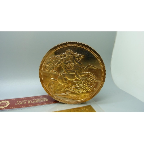 896 - Shop display oversized Sovereign and Krugerrand coins and 24ct gold plated banknotes