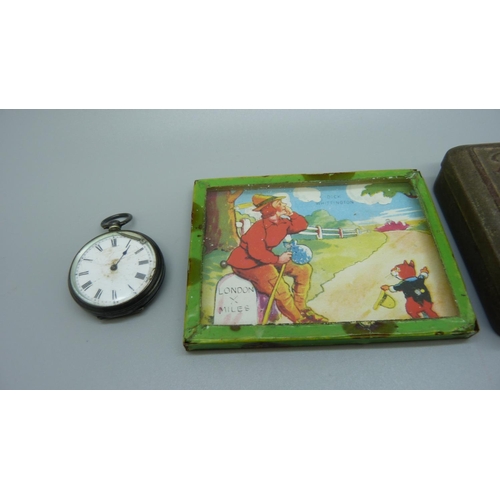 902 - An Art Nouveau tin, Dick Whittington game and a silver fob watch, a/f