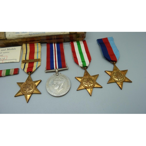 906 - Four WWII medals, with ribbons in original postage box