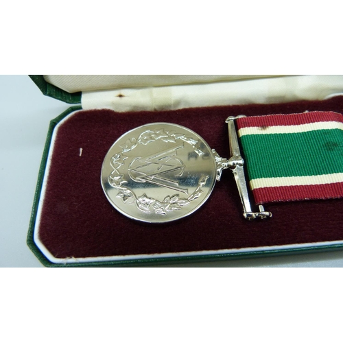 911 - A Women's Voluntary Service Medal, cased