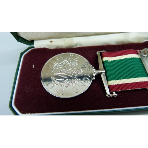 911 - A Women's Voluntary Service Medal, cased