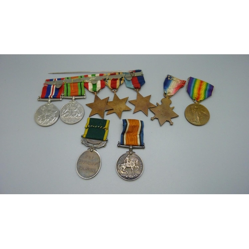 913 - A set of nine medals; five WWII medals and bar and a trio of WWI and Territorial Efficient Service m... 