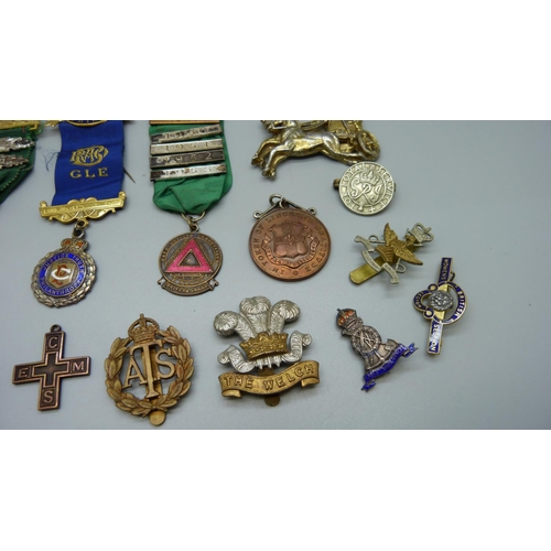 922 - Assorted medals and Regimental badges including two silver