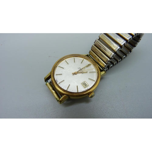 941 - An Omega automatic wristwatch with date, boxed with booklet