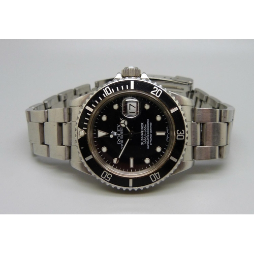 942 - A Rolex Oyster Perpetual Submariner wristwatch, stainless steel case and bracelet strap, dial marked... 