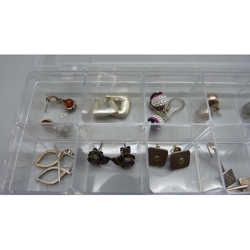 944 - Eighteen pairs of silver earrings