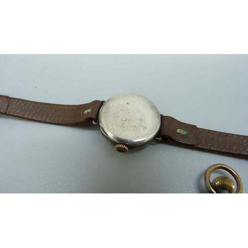 947 - A lady's silver wristwatch, pocket watch and a fob watch