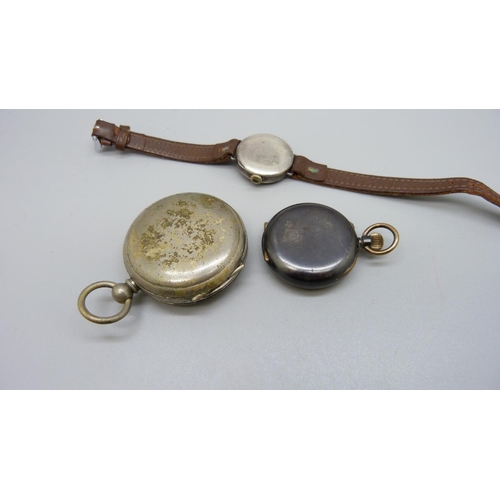 947 - A lady's silver wristwatch, pocket watch and a fob watch