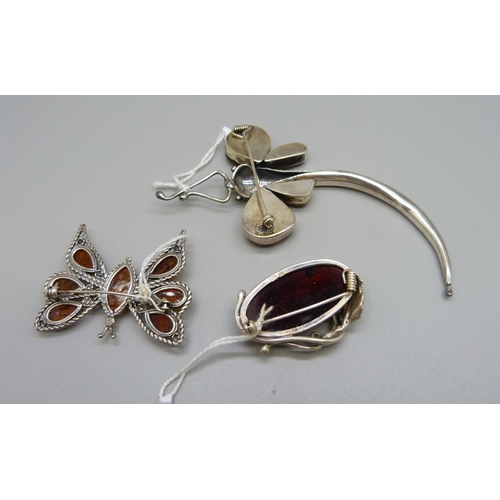 963 - Three silver amber set brooches