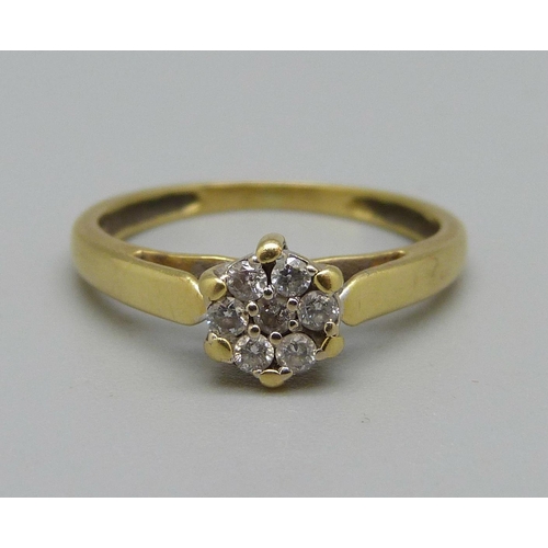 971 - A yellow metal and diamond daisy cluster ring, 2.5g, K