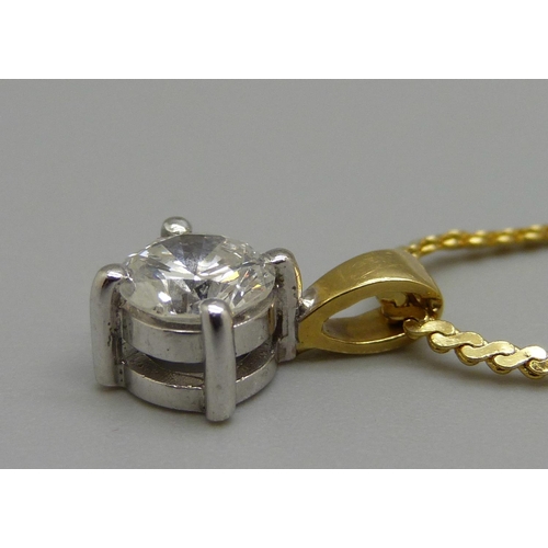 977 - An 18ct gold diamond pendant, approximately 0.90ct diamond weight on a plated chain