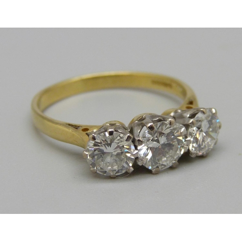 978 - An 18ct gold and diamond trilogy ring, approximately 1.70ct diamond weight, 3.0g, O