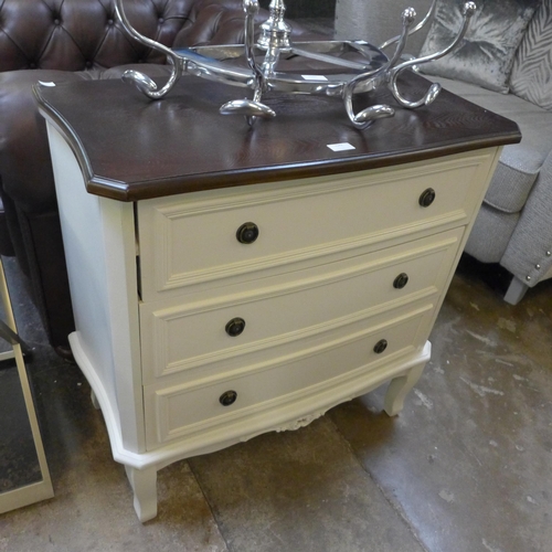 1438 - A three drawer chest with contrasting top