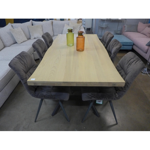 1301 - A wave oak dining table six Arana dining chairs