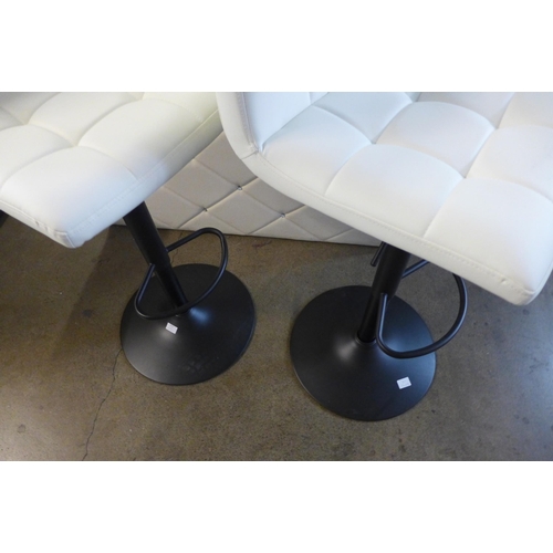 1312 - A pair of black and cream bar stools