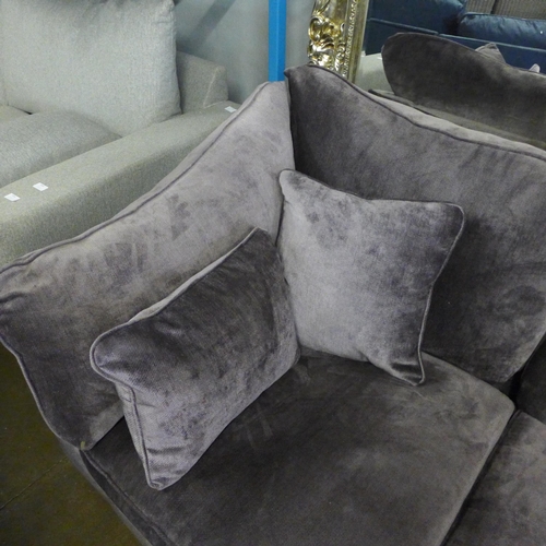 1405 - A periwinkle upholstered two seater with oak feet - RRP    £1415