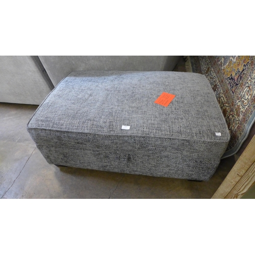 1487 - A dark grey upholstered ottoman footstool