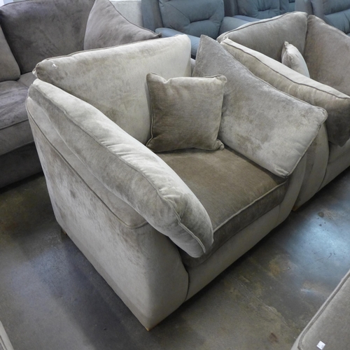 1519 - A mink upholstered oversized armchair with oak feet - RRP £1175