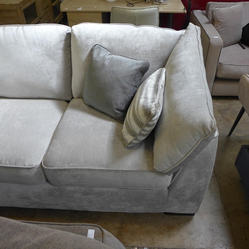 1552 - An Aluminium upholstered corner sofa with black oak feet RRP £3995