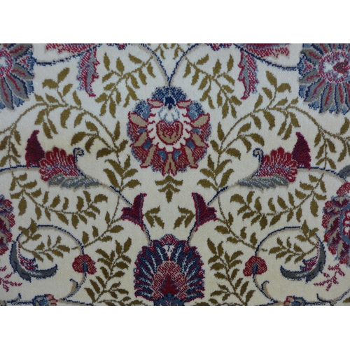 1555 - Ivory ground cashmere all over floral patterned rug, 230x160cm