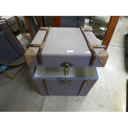 1615 - A cadet grey upholstered storage chest - sun bleached top