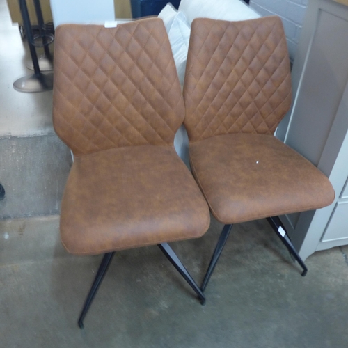 1509 - A pair of tan upholstered side chairs