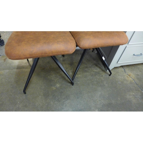 1509 - A pair of tan upholstered side chairs