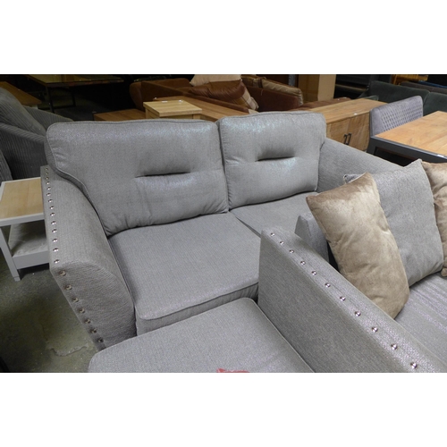 1611 - A Coco four seater sofa, love seat and footstool