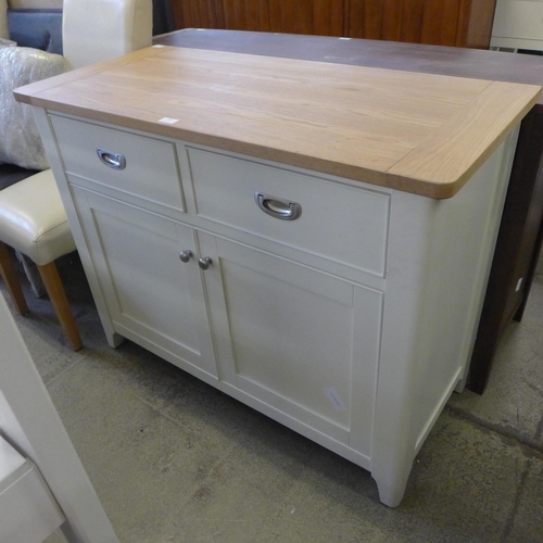 1696 - A white painted and oak two drawer, two door sideboard