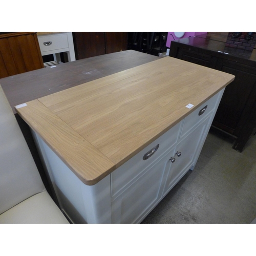 1696 - A white painted and oak two drawer, two door sideboard