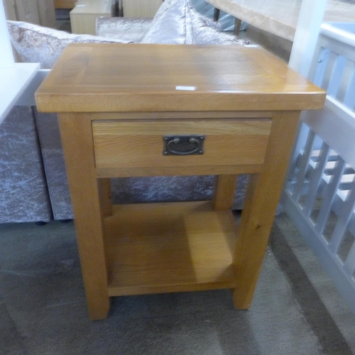 1707 - An oak single drawer console table