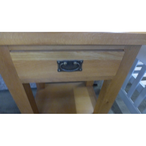 1707 - An oak single drawer console table